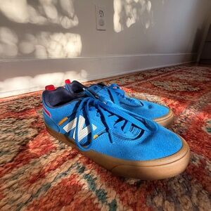 New Balance Blue Suede Sneakers with Gum Brown Sole and Red Accents